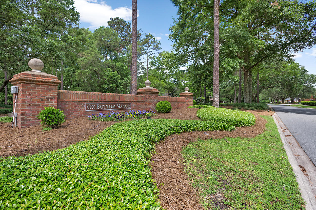 Red brick Ox Bottom neighborhood entrance sign in Tallahassee FL