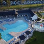 Canopy neighborhood amenities, aerial photo of pool, splash pad and community center